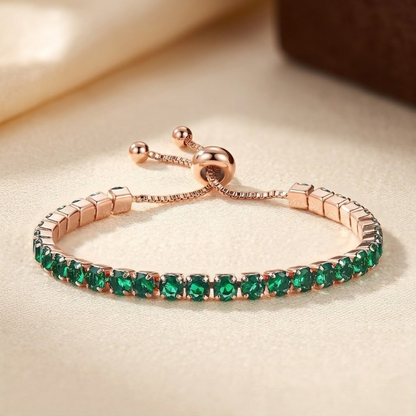 Bracelet de tennis réglable avec émeraude en or