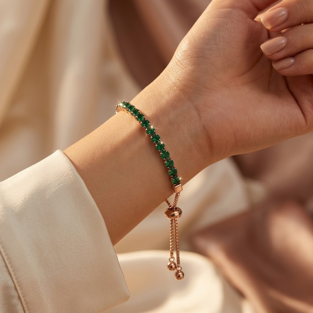 Bracelet de tennis réglable avec émeraude en or