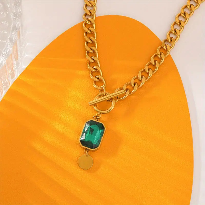 Collier en or avec émeraude