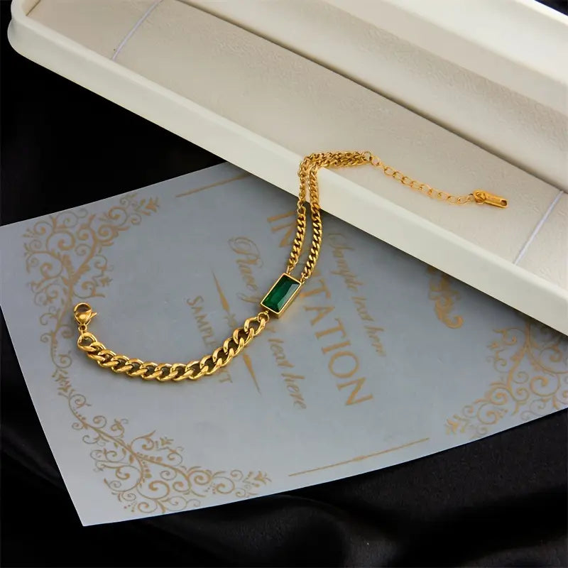 Bracelet en or avec barrette et émeraude