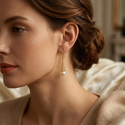 Boucles d'oreilles pendantes en filigrane avec perle en or